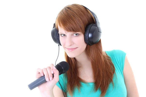 Lycklig tonåring med hörlurar och mikrofon — Stockfoto
