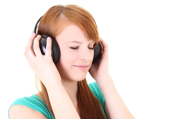 Adolescente em fones de ouvido com olhos de perto — Fotografia de Stock