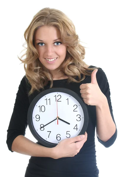 Happy woman in black with clock Stock Image
