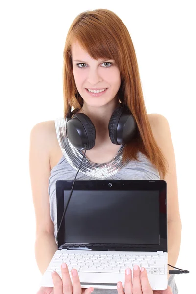 Adolescente felice con cuffie e portatile — Foto Stock