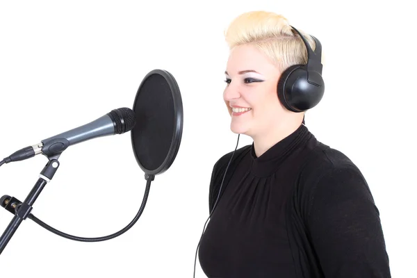 Stock image Happy blonde woman with microphone