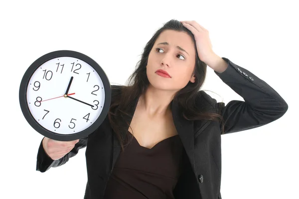 Geschokt zakenvrouw met klok — Stockfoto