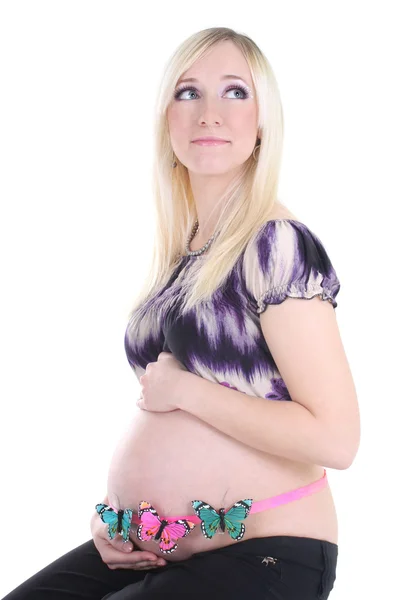 Mujer embarazada con mariposas en el vientre —  Fotos de Stock