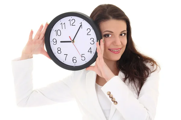 Smiling brunette woman showing clock — Stock Photo, Image