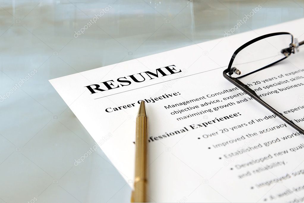 Closeup resume paper with qualifications on the desk during job