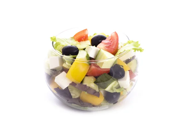 Greek salad in glass bowl — Stock Photo, Image
