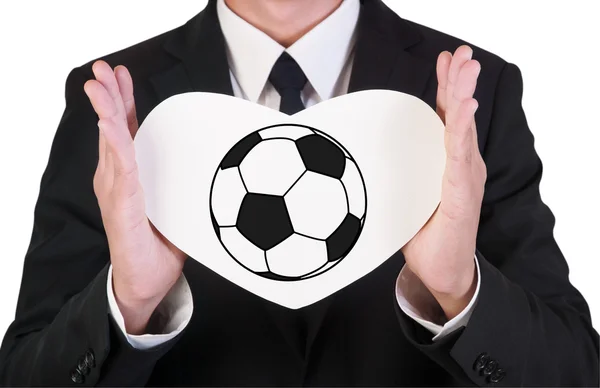 Podnikatel drží papír láska fotbal — Stock fotografie