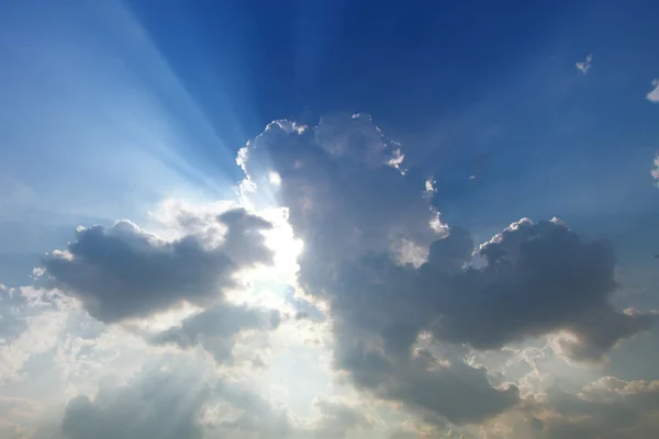 Sunbeam through the haze on blue sky — Stock Photo, Image