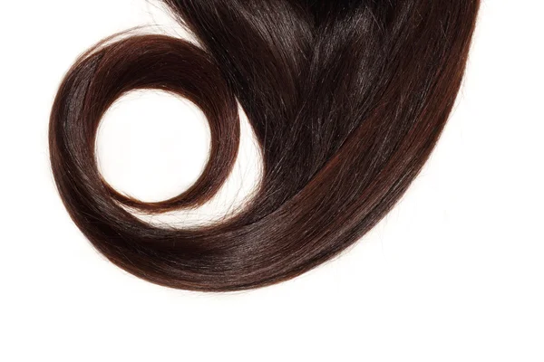 Fechadura do cabelo marrom grosso — Fotografia de Stock