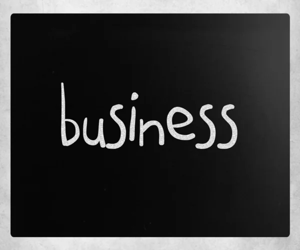 "Negócio "manuscrito com giz branco em um quadro-negro — Fotografia de Stock