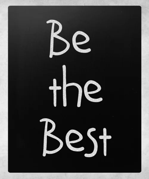 "Essere il migliore "scritto a mano con gesso bianco su una lavagna — Foto Stock