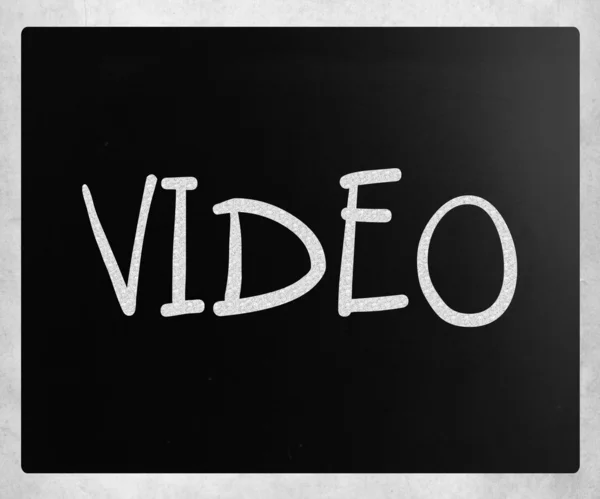 "Video"fehér krétával egy táblára kézzel — Stock Fotó