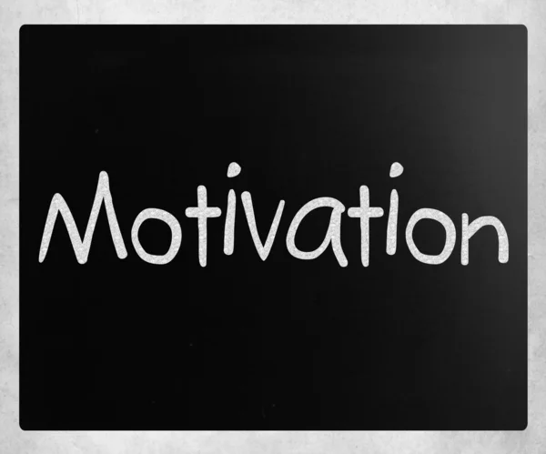 "Motivace "psáno bílou křídou na tabuli — Stock fotografie