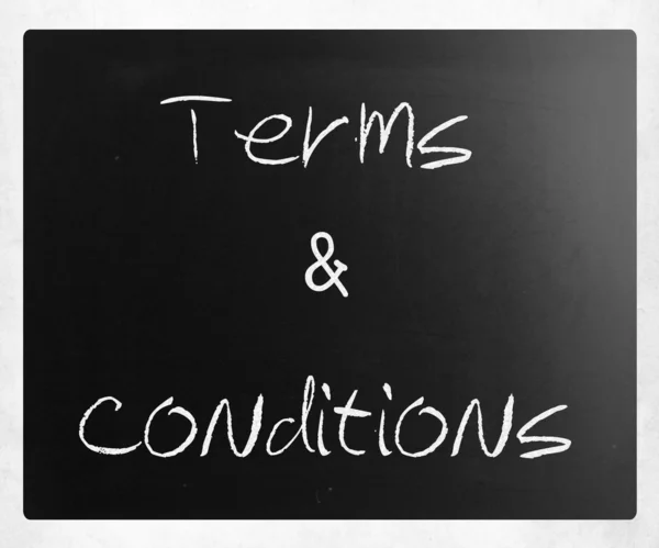 "Terms & Conditions" handwritten with white chalk on a blackboar — Stock Photo, Image