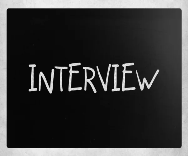 "Entrevista "manuscrito com giz branco em um quadro-negro — Fotografia de Stock