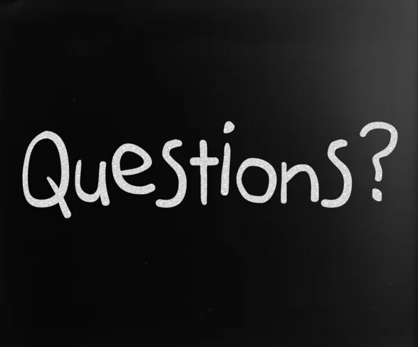 "Question" handwritten with white chalk on a blackboard — Stock Photo, Image