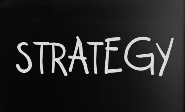 La parola "Strategia" su una lavagna — Foto Stock