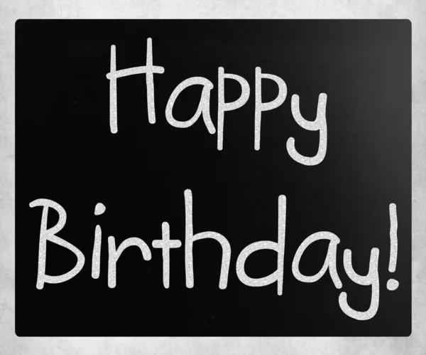 "Happy Birthday" handwritten with white chalk on a blackboard — Stock Photo, Image