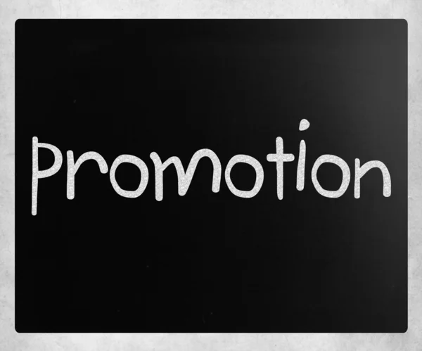 Das Wort "Promotion" handgeschrieben mit weißer Kreide auf einem schwarzen Eber — Stockfoto