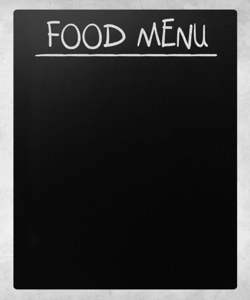 "Food menu "handwritten with white chalk on a blackboard — стоковое фото