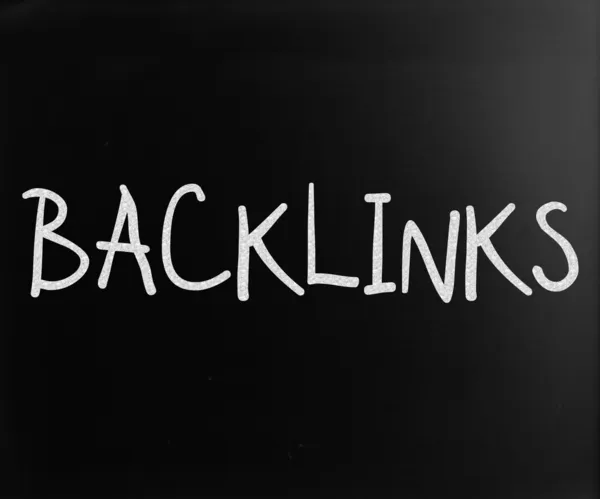 Das Wort "Backlinks" handgeschrieben mit weißer Kreide auf einem schwarzen Eber — Stockfoto