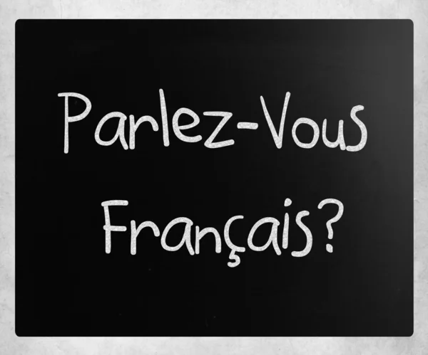 "Parlez-Vous Franpresidentais? " Надпись от руки белым шальком на чёрном — стоковое фото