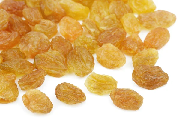 Heap of yellow raisin on white — Stock Photo, Image