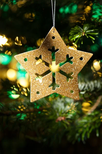 Decorativo ornamento stella d'oro — Foto Stock