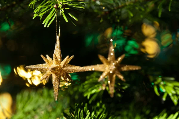 Dekorativní Zlatá hvězda ornament — Stock fotografie