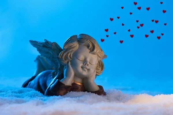Láska srdce ukazuje angel — Stock fotografie