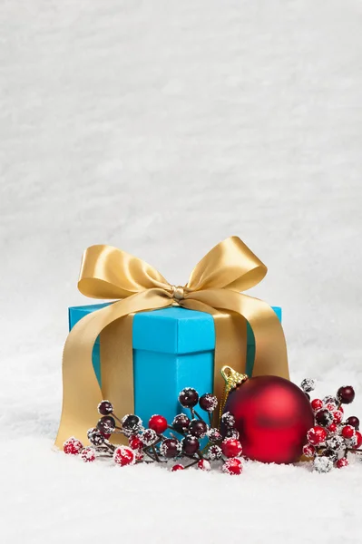 Present in festive decoration — Stock Photo, Image
