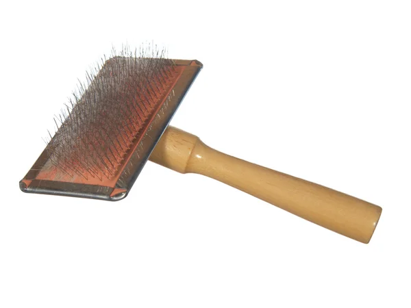 Brush the dog or cat hair stuck to the, isolated on the white ba — Stock Photo, Image