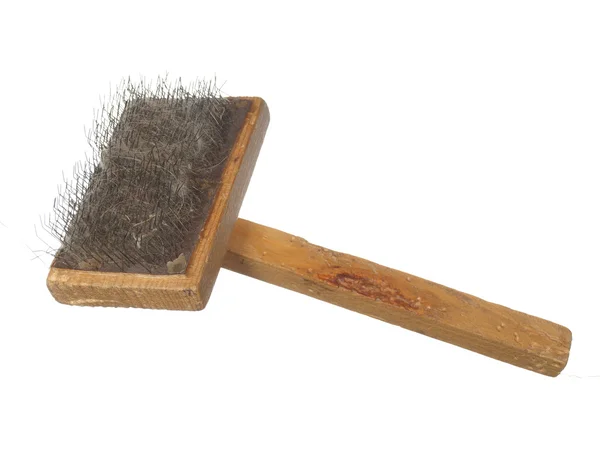 Old brush the dog or cat hair stuck to the, isolated on the whit — Stock Photo, Image