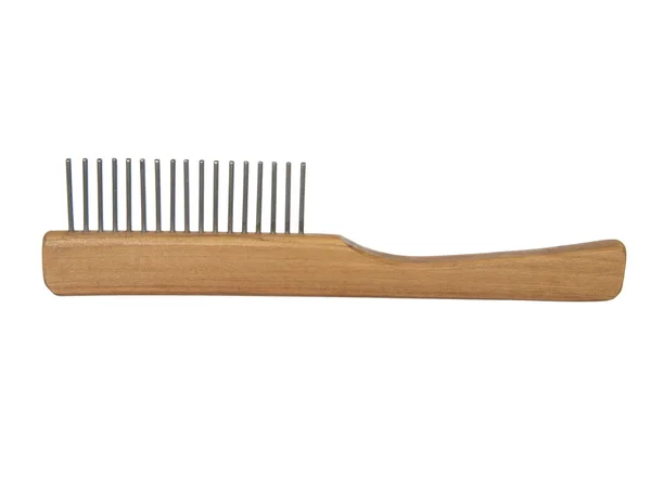 Wooden comb for a dog or cat with metal prongs, isolated on the — Stock Photo, Image
