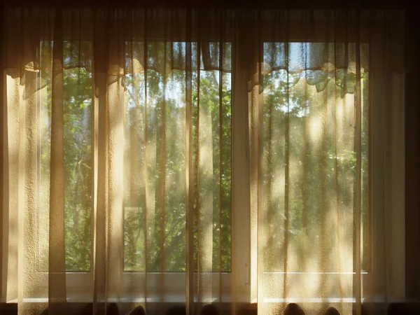 stock image View to outside in a very darken room.