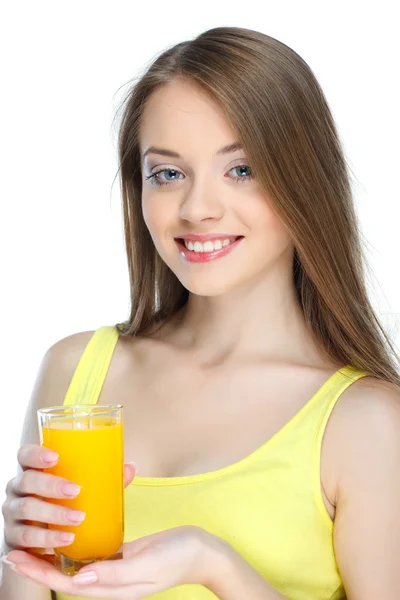 Portrait of a pretty young woman with glass of juice isolated on a white background — Stock Photo, Image