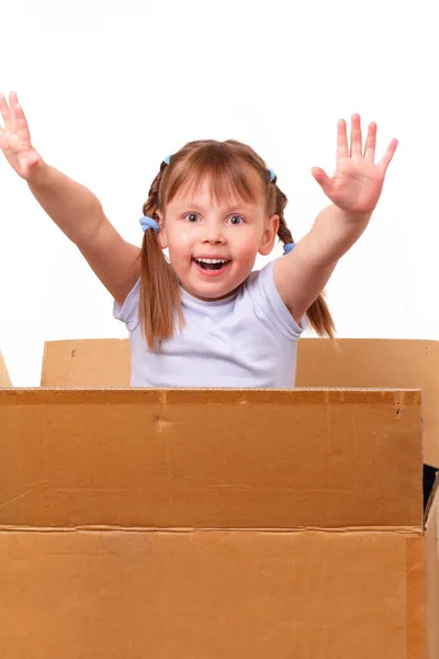 Little girl is happy moving to a new house — Stock Photo, Image