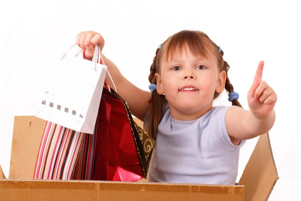 Little girl returned from the sale with purchases — Stock Photo, Image