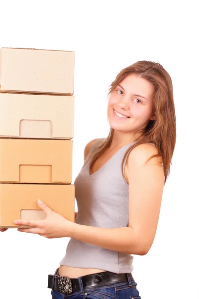 Beautiful young girl moving into a new house — Stock Photo, Image