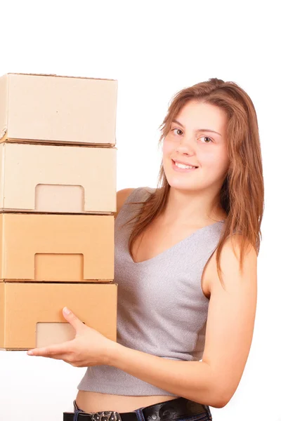 Beautiful young girl with cardboard boxes — Stock Photo, Image