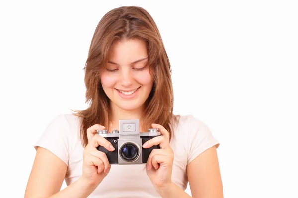 Sorrindo jovem com uma câmera velha — Fotografia de Stock