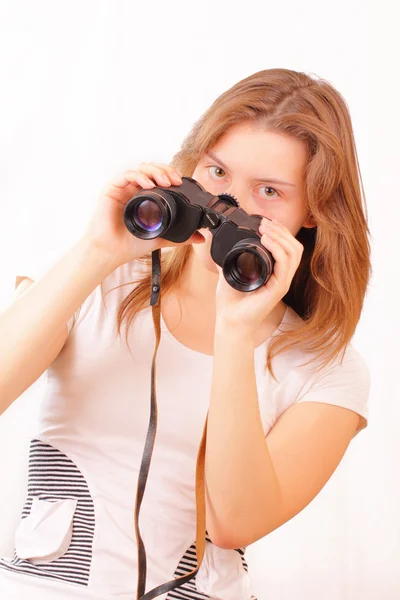 Beautiful young girl with binoculars — Stock Photo, Image
