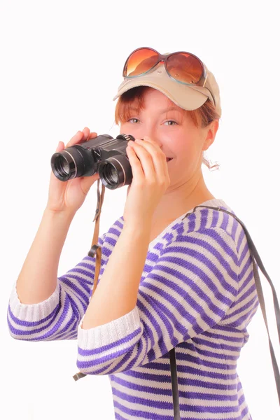 Beautiful young girl with binoculars in her hands — Stock Photo, Image