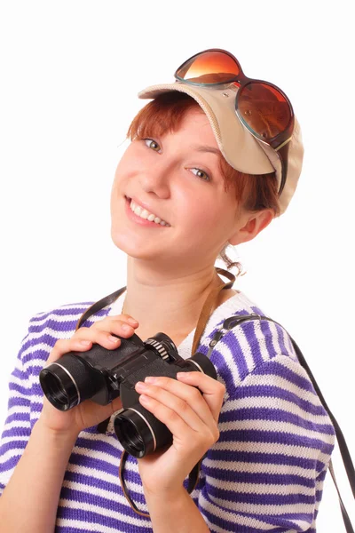 微笑与 bonoculars 的年轻女孩 — 图库照片