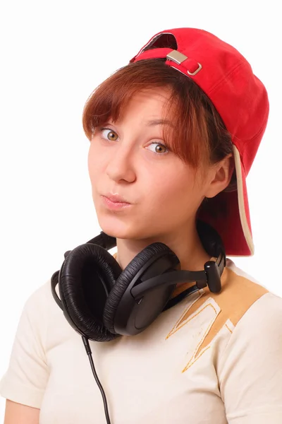 Aantrekkelijke jonge meisje met hoofdtelefoons — Stockfoto