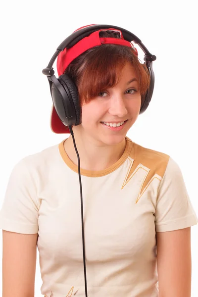 风趣的年轻女孩 litening 带耳机的音乐 — 图库照片