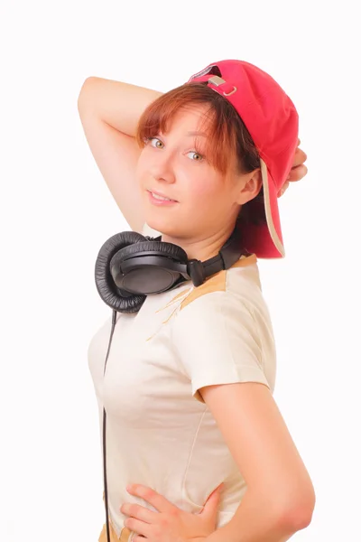 Chica joven divertida con auriculares — Foto de Stock