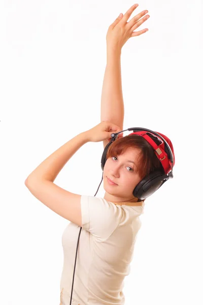 Krásná mladá dívka se sluchátky — Stock fotografie