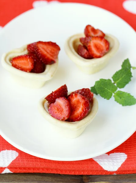 Fruit dessert - tartlets with strawberries — Stock Photo, Image