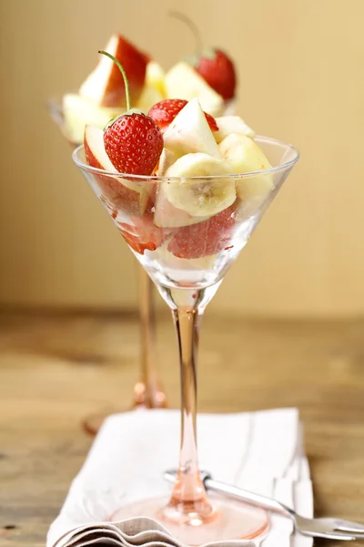 stock image Fruit salad in glass goblets on the table